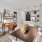 a dining room with a table and chairs