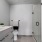 a bathroom with a sink toilet and a shower