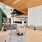 a clubhouse room with a tv and chairs