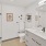 a bathroom with a sink toilet and mirror