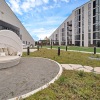 a courtyard with a large chair