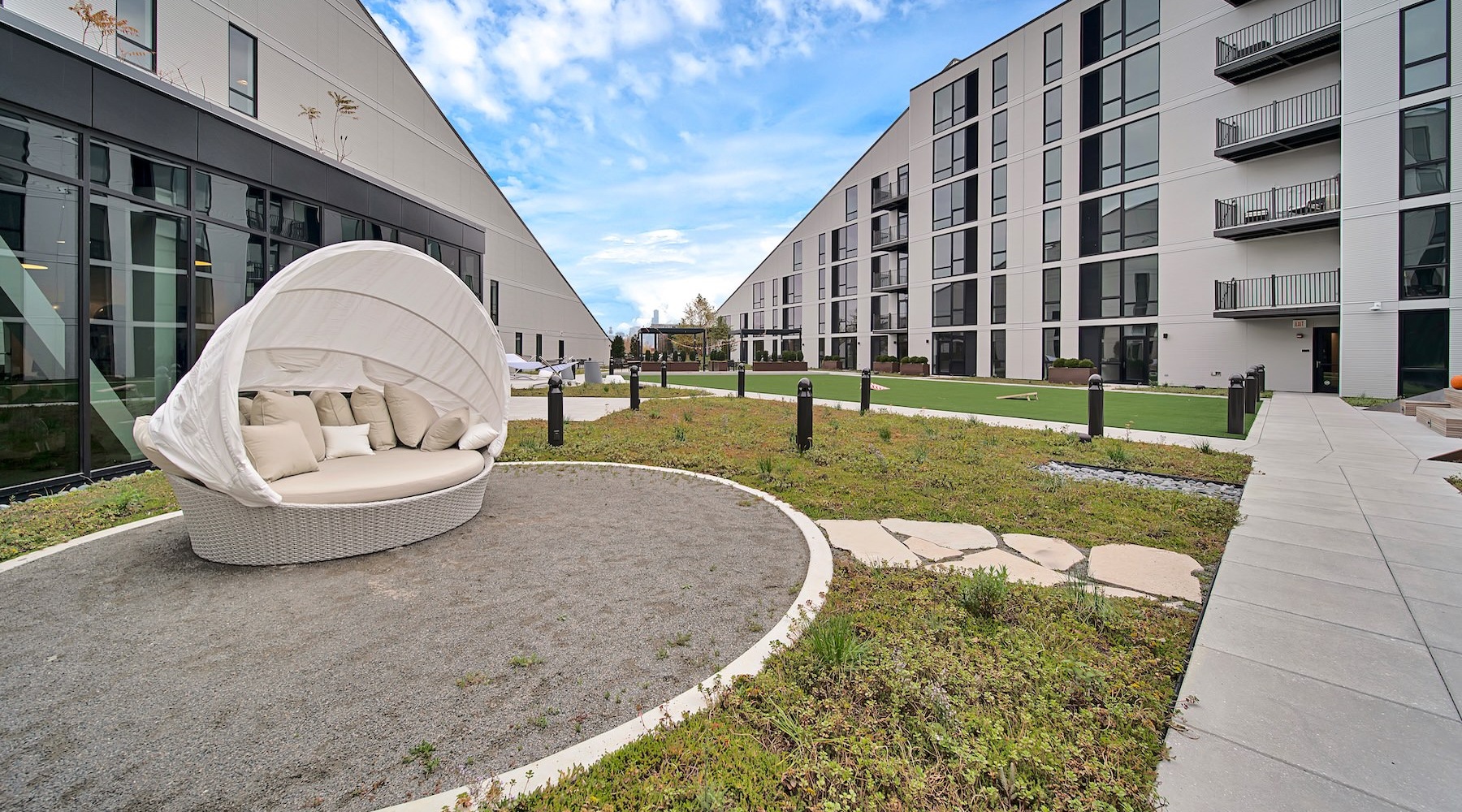 a courtyard with a large chair