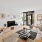 a living room with a large glass door