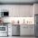 a kitchen with white cabinets