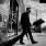 a man walking out of a train