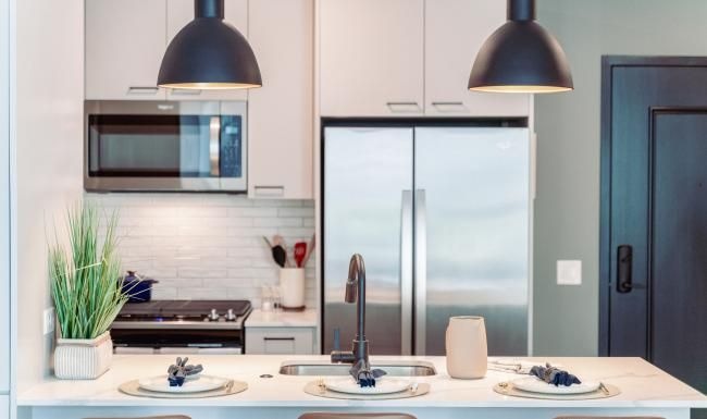 a kitchen with a table and a sink
