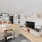 a living room with a tv and furniture