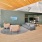 a clubhouse room with a couch and chairs